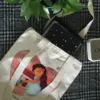 Bag Top View with Props Home is Where Heart Is